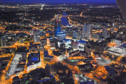 Aerial photo of downtown Rochester at night.